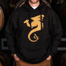 Load image into Gallery viewer, A person wearing a black hoodie with a gold dragon logo on the front.
