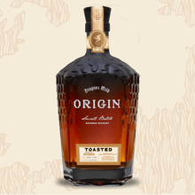 Load image into Gallery viewer, Bottle of Dragon's Milk Origin Toasted bourbon whiskey on a beige background

